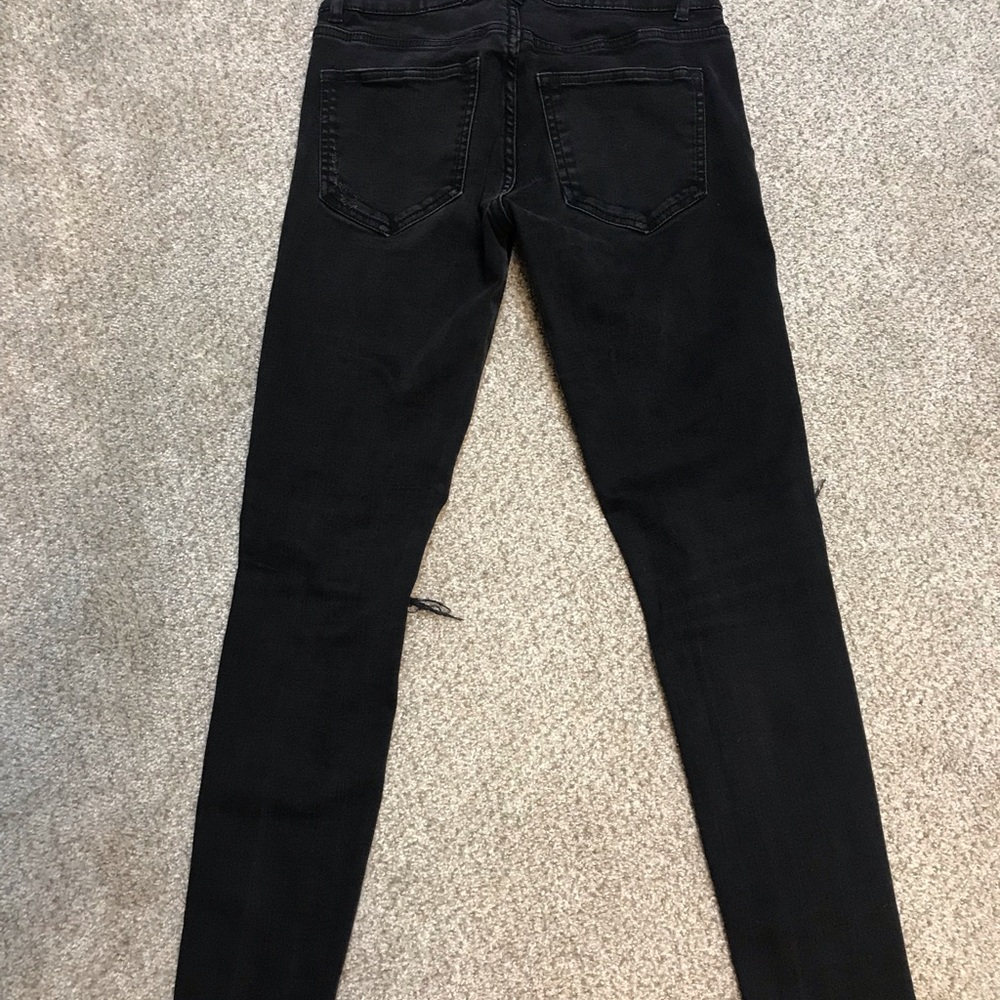 Distressed black skinny
